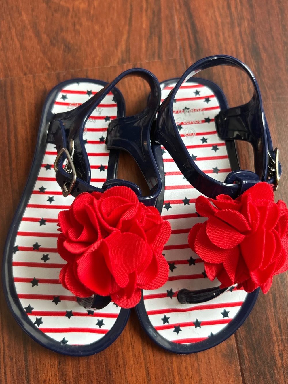 Starting Out Navy Sandal with Red Flower Accent